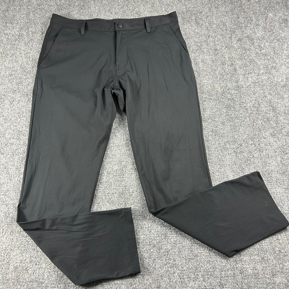 Rhone Commuter Pants Mens 36 Black Performance Flat Front Trousers Golf Casual